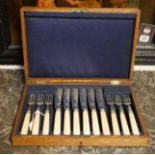 AN EARLY 20TH CENTURY SET OF SILVER FISH KNIVES AND FORKS Six knives and forks with bone handles,