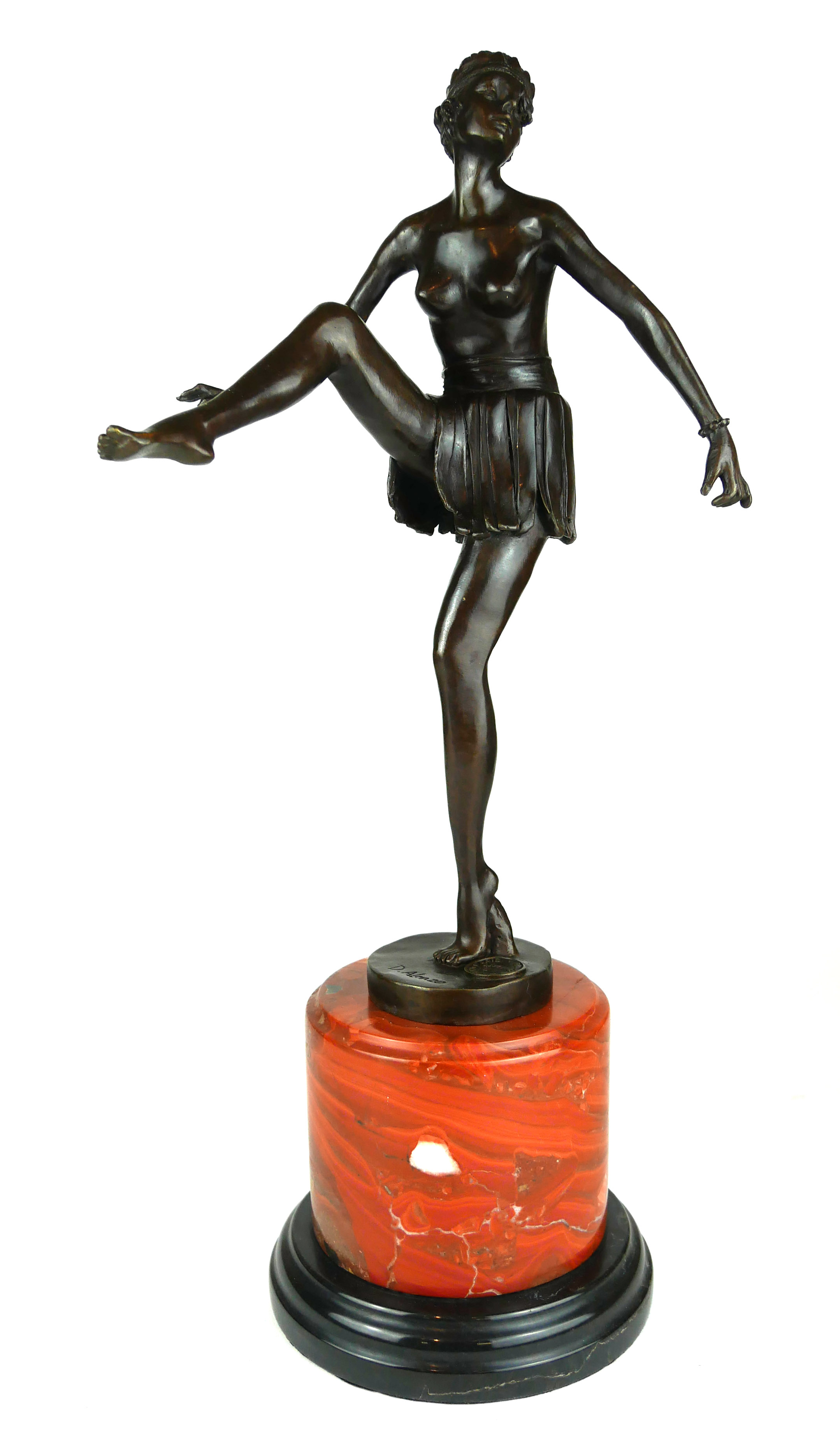 AN ART DECO STYLE BRONZE STATUE, SEMICLAD DANCING GIRL On a rouge marble plinth. (49cm) Condition: