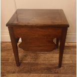 A GEORGIAN MAHOGANY LOW SIDE TABLE The rise and fall top above a shaped apron, raised on square