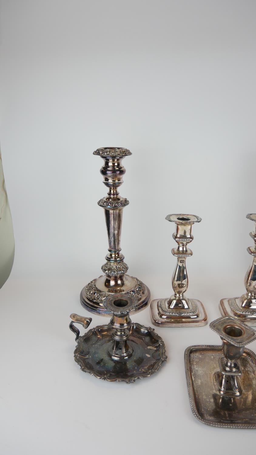 A COLLECTION OF 19TH CENTURY AND LATER SILVER PLATE ON COPPER CANDLESTICKS, A pair with embossed - Image 2 of 2