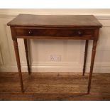 AN EARLY VICTORIAN MAHOGANY SIDE TABLE With single drawer and raised on for ring turned legs,