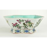 A CHINESE FAMILLE VERTE PORCELAIN BOWL Convex rectangular form with hand painted decoration of birds