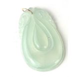 A CHINESE YELLOW METAL AND ICY JADE PENDANT Carved oval form with yellow metal bale. (approx 6cm x