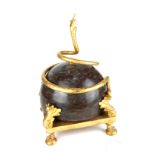 A GILT BRONZE AND MARBLE CENTREPIECE, SERPENTINE ENTWINED BALL. (35cm) Condition: good