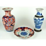 A LATE 19TH CENTURY CHINESE PORCELAIN BLUE AND WHITE BALUSTER VASE Decorated with continuous