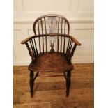 A 19TH CENTURY ASH AND ELM HOOP BACK WINDSOR ARMCHAIR. (58cm x 43cm x 89cm)