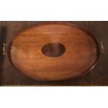 AN EDWARDIAN MAHOGANY AND INLAID OVAL TRAY With two brass carrying handles. (64cm x 42cm)