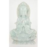A LARGE CHINESE CARVED PALE GREEN JADE FIGURE OF QUAN YIN Seated pose, on a double lotus base. (