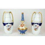 ROSENTHAL, A PAIR OF EARLY 20TH CENTURY GERMAN PORCELAIN VASES Twin gilt handles and exotic bird