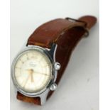A VINTAGE RUSSIAN STAINLESS STEELGENT'S WRISTWATCH Circular dial marked 'Cushan CCCP', on brown