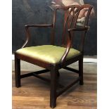 A GEORGIAN MAHOGANY OPEN ARMCHAIR With pierced back, shepherds crook arms, upholstered drop in seat,