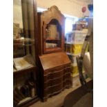 AN 18TH CENTURY DESIGN DUTCH WALNUT BUREAU BOOKCASE The domed top above a single glazed door,