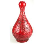 A CHINESE HIGH FIRED RUBY RED BALUSTER VASE Decorated with exotic beasts and foliage. (40cm)