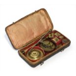 A brass and steel coin scale,