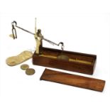 A brass and steel equal arm pull-out scale,