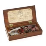 A mahogany cased apothecary's coin scale,