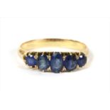 A gold five stone sapphire ring,
