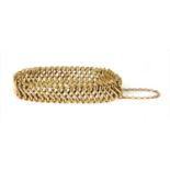 A gold bracelet,