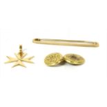 A gold bar brooch,