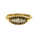 An 18ct gold boat shaped five stone diamond ring,