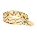 A 9ct gold five row gate bracelet,