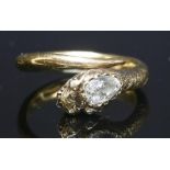 A diamond set gold snake or serpent ring,