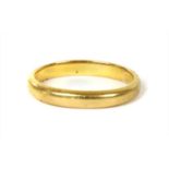 A gold D section wedding band,