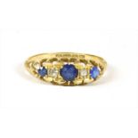 An 18ct gold sapphire and diamond ring,