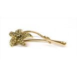 A gold diamond and split pearl floral brooch,