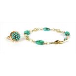 A gold turquoise bombé ring,