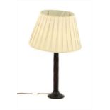 A modern bronze and glass twist column table lamp with shade,