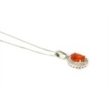 A white gold fire opal and diamond cluster pendant,