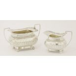 A Victorian silver sugar bowl and milk jug,