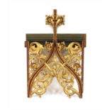 A carved giltwood ecclesiastical panel,