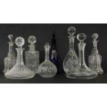 A collection of glass decanters,