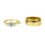An 18ct gold D section wedding ring,