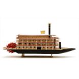 A scratch built model of a paddle steamer,