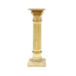A carved wooden cream painted and parcel gilt pedestal,