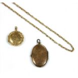 A 9ct gold circular locket,