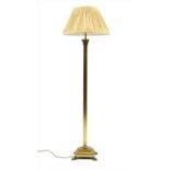 A brass Corinthian column standard lamp,