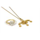 A gold Minoan bee pendant,