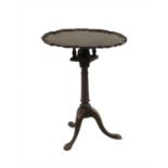 A mahogany tripod table,