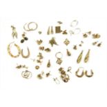 Eighteen pairs of gold stud earrings,