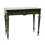 An ebonised tortoiseshell and gilt metal and brass mounted foldover card table,