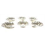 Nine American silver plated coquille St Jacques dishes,