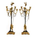 A pair of bronze and ormolu candelabra,