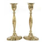 A pair of modern silver candlesticks,