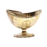 A George III silver navette shaped sweetmeat basket,