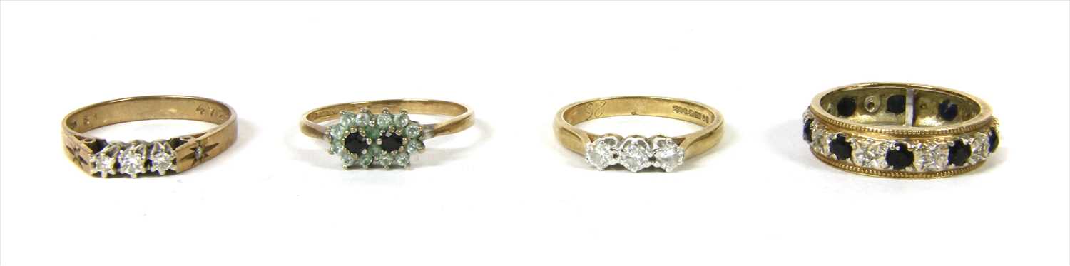 Four 9ct gold rings,