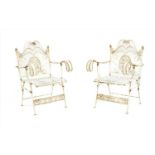 A pair of iron folding garden chairs,